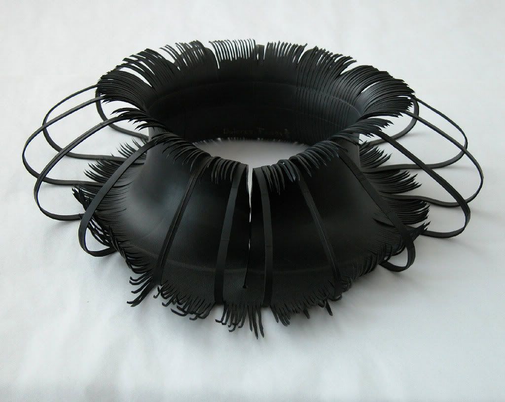 Thea Tolsma black rubber collar  
