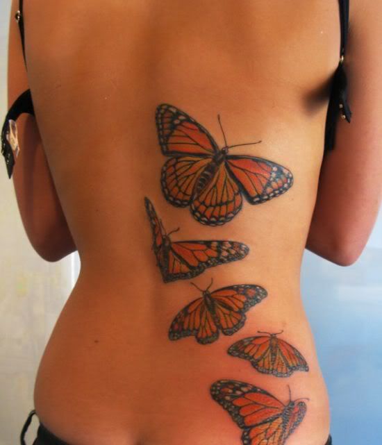 piercing and butterfly tattoo