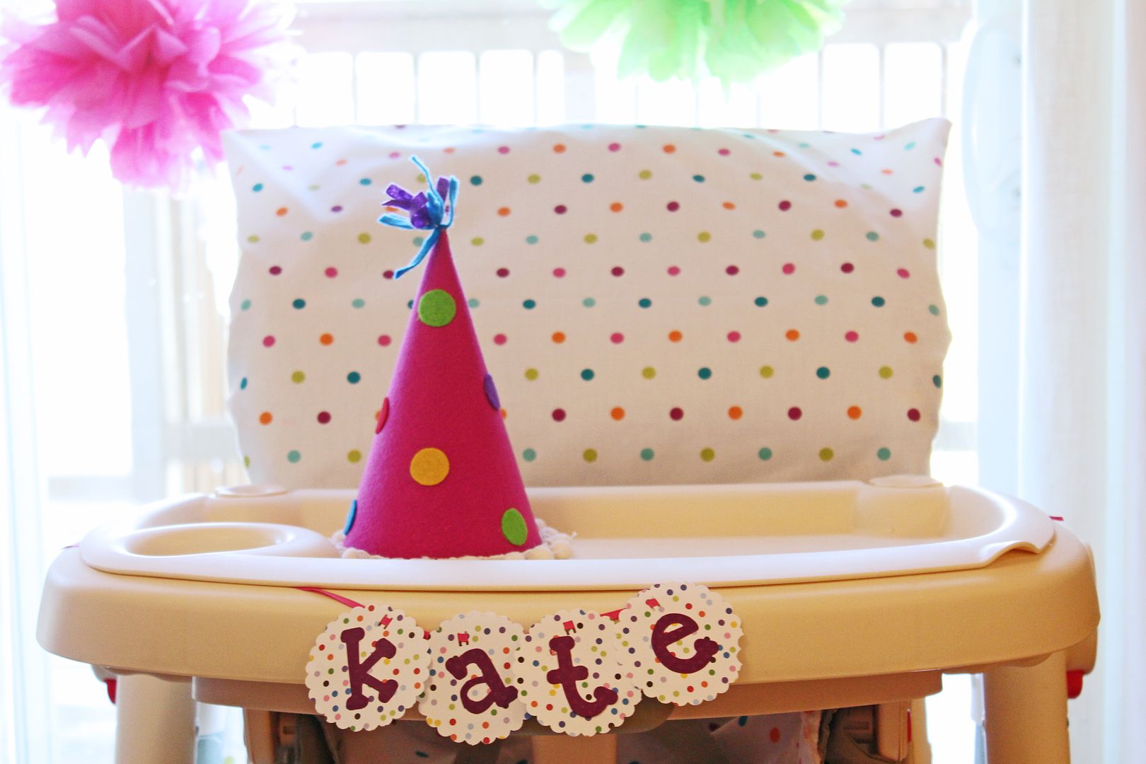 DIY high chair cover, first birthday party, colorful birthday party, tissue poms