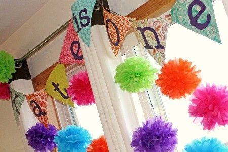 first birthday party, colorful birthday party, tissue poms, DIY birthday party bunting