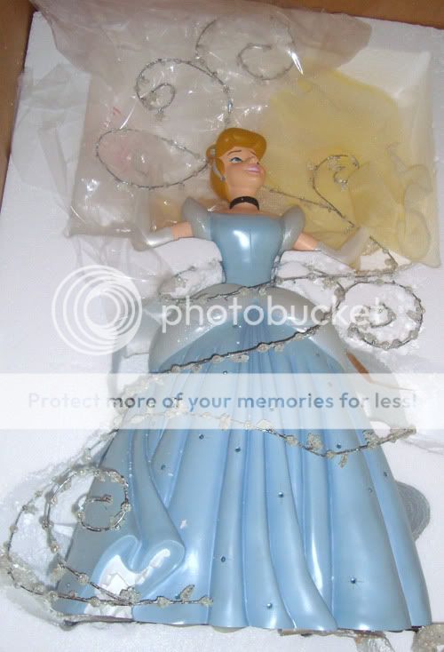 This wonderful figurine captures the magical moment when Cinderellas 