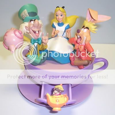   world storybook ornament.alice in wonderland teacup ride ornament